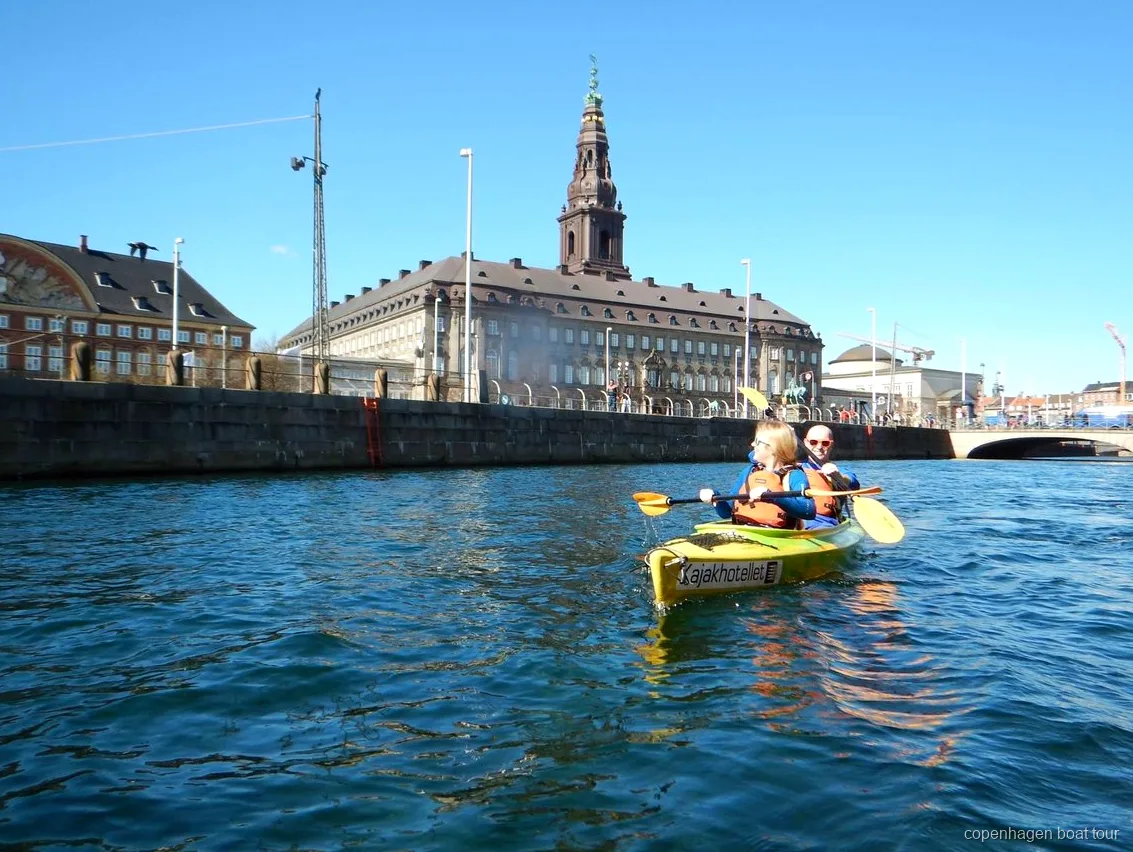 Paddlers on the Copenhagen harbor kayak tour entering Christianshavn's canals